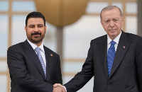 Turkish President Recep Tayyip Erdogan, right, welcomes Iraqi Prime Minister Ali al-Zaidi