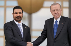 Turkish President Recep Tayyip Erdogan, right, welcomes Iraqi Prime Minister Ali al-Zaidi