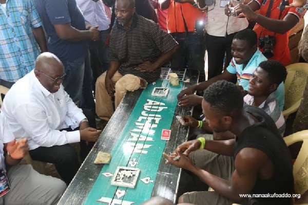 Akufo-Addo (in white on the left side of the bench)