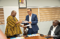 CEO of EXIM Bank Sylvester Adinam Mensah (L) with the Ghana International Bank, Ian Greenstreet