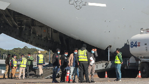 Migrants seen at the airport