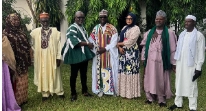 Alhaji Halidu Haruna in a photograph with other dignitaries