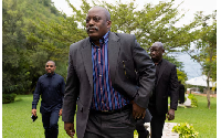 Democratic Republic of Congo's former President Joseph Kabila walks to attend a meeting