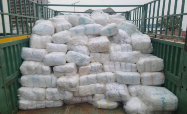 Confiscated diapers at the back of a truck