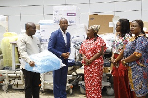 Representatives from the Office of the First lady presenting the items to hospital administrators