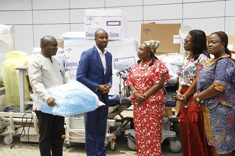 Representatives from the Office of the First lady presenting the items to hospital administrators