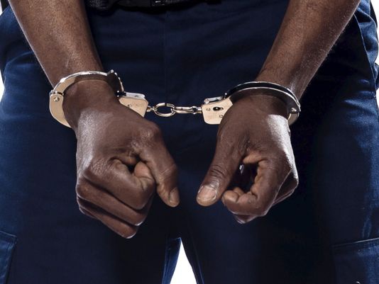 A man in handcuff (file photo)