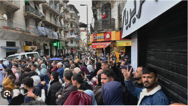 Algerians gather in downtown Algiers to see Pope Leo XIV, on the first day of an 11-day visit