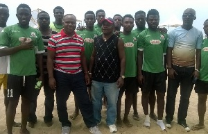 Amartey (4th L) with the team after the presentation