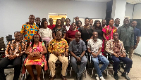 Participants at theengagement in a group picture
