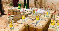 The police sometimes display bottles of the smuggled alcohol they have seized