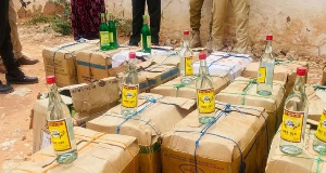 The police sometimes display bottles of the smuggled alcohol they have seized