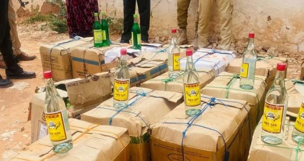 The police sometimes display bottles of the smuggled alcohol they have seized