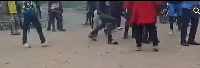 A screenshot from the video of some of the men wielding deadly weapons