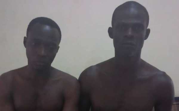 The two alleged suspects arrested by the Police