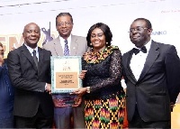 Mrs. Barbara Oteng-Gyasi (second right) presenting award to Golden Star Resources