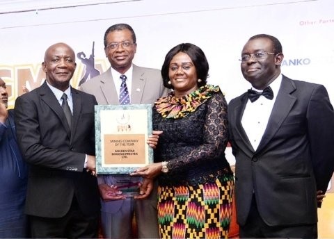 Mrs. Barbara Oteng-Gyasi (second right) presenting award to Golden Star Resources