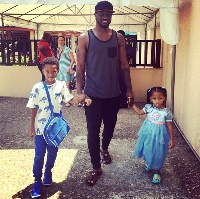 Peter Okoye with his kids