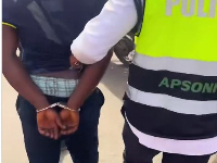 Snipped of the taxi driver in handcuff