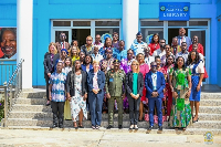 Photo of some diginitaries in a group picture after the program