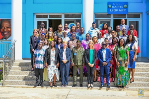 Photo of some diginitaries in a group picture after the program