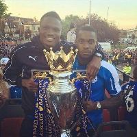 Leicester's Schlupp and Amartey with the EPL trophy