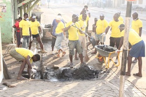Vivo Energy Ghana Staff and Community Members cleaning their community