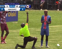 The moment the referee knelt down to caution Mlotshwa