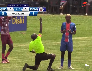 The moment the referee knelt down to caution Mlotshwa