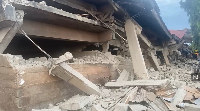 The three-storey building collapsed killing three people