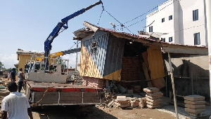 A container being lifted by the taskforce