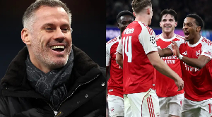 A photo of Jamie Carragher and Arsenal players