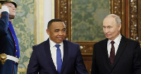 President Vladimir Putin, right, and Madagascar's President Michael Randrianirina