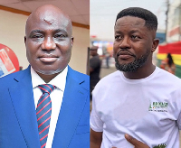 The minister of Agriculture Eric Opoku (L) and the poultry farmer (R)