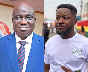 The minister of Agriculture Eric Opoku (L) and the poultry farmer (R)
