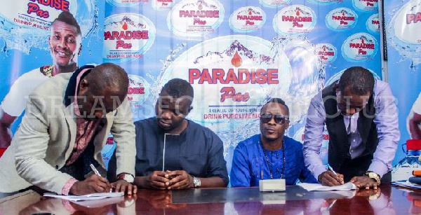 Dreams FC sign on Paradise Pac as official water sponsor.