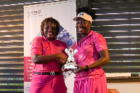 Charity Vogel ( R) receiving her winner’s trophy from Kous Louanges Mang