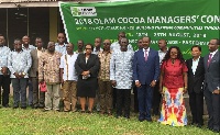 Olam officials in a group photo with COCOBOD CEO, Mr Boahen Aidoo