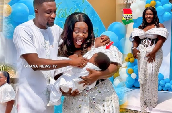 Tima Kumkum and her husband captured during the christening ceremony