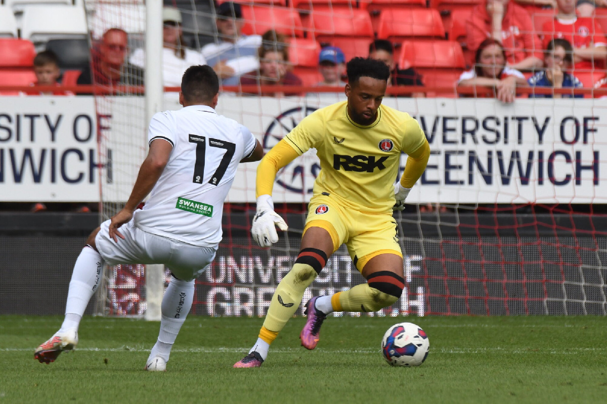 Wollacott (right) in action for his club