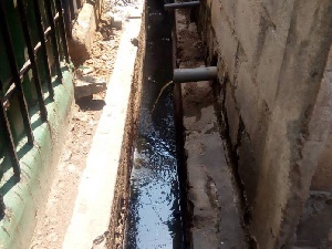The Traders are worried over discharge of sewage from a public toilet into the market open gutters