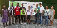 The winners displaying their trophies