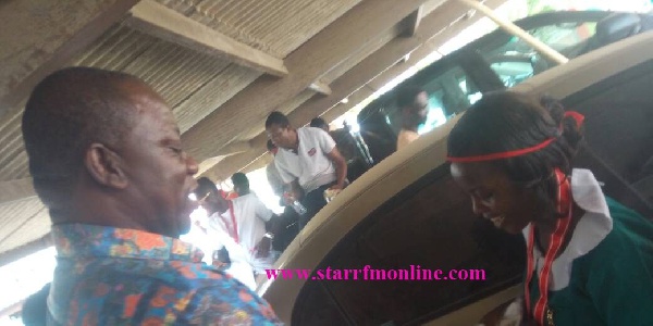 Deputy Minister of Agriculture, George Oduro interacting with one of the nurses