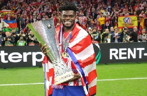 Thomas Partey with the Europa League trophy