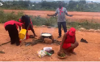 Some protestors were captured cooking by the road side