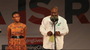 Former president John Mahama with his interpreter on stage