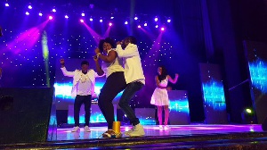 Lydia Forson on stage with Okyeame Kwame
