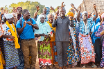 AAK producer with some women shea collectors
