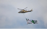 A Nigerian military helicopter flies in midair