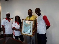 Staff of St. Peters Mission School with a citation plaque